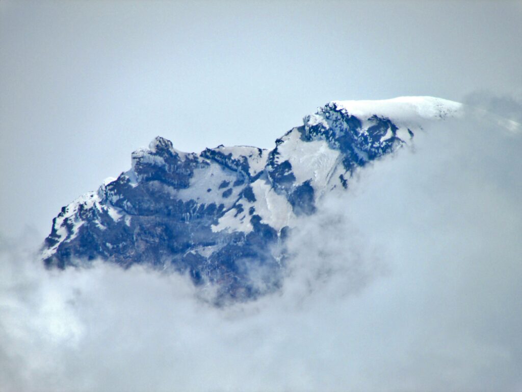 mountain peak summit clouds modern