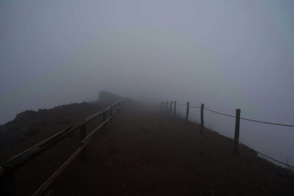 fog mountain path uncertain visibility