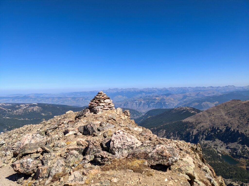 mountain summit clear view confident