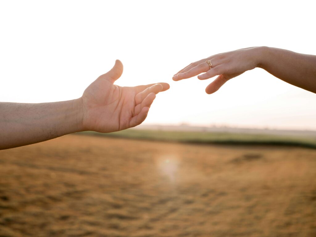 giving hands sunset meaningful